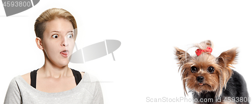 Image of Woman with her dog over white background