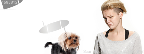 Image of Woman with her dog on leash over white background