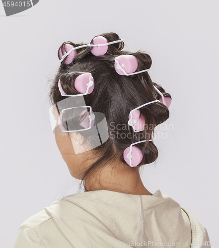 Image of Woman with Curlers