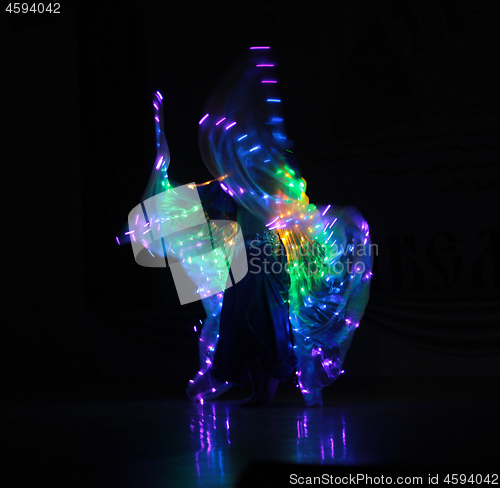 Image of electric light dance in the dark