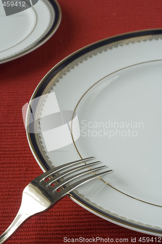 Image of fork and plates in perspective