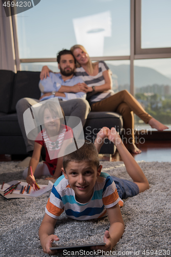 Image of young couple spending time with kids