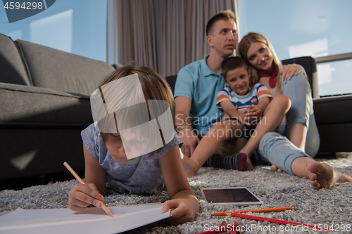 Image of young couple spending time with kids