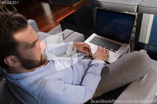 Image of man working from home