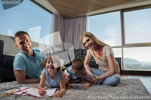 Image of young couple spending time with kids