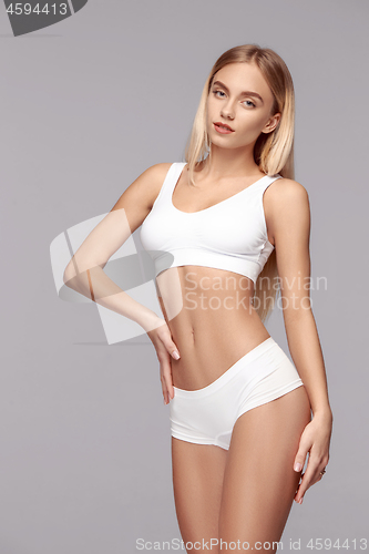 Image of Perfect slim toned young body of the girl .