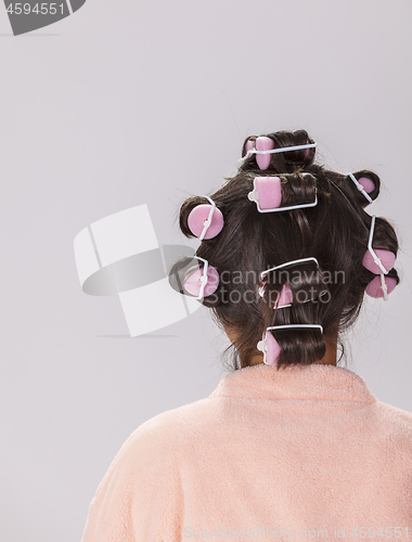 Image of Woman with Curlers