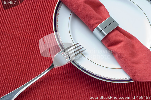 Image of fork, plate and napkin