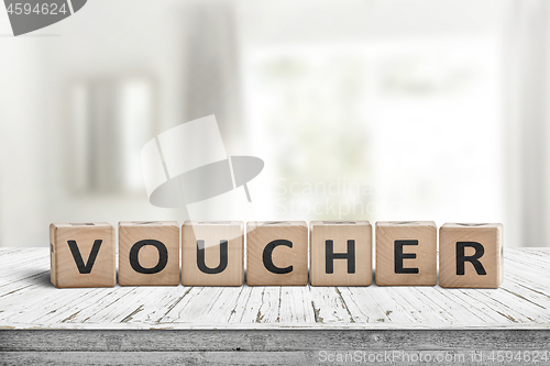 Image of Voucher sign in a bright room