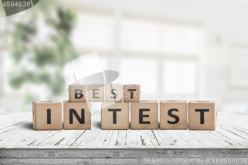 Image of Best in test sign on a wooden table