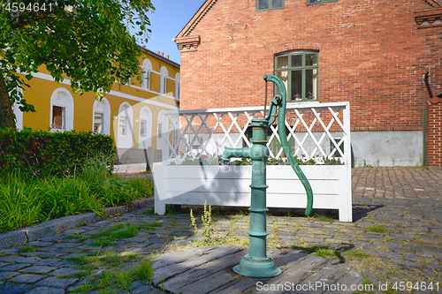 Image of Turquoise fire hydrant on a street