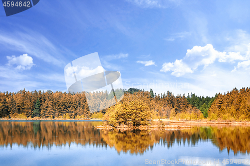 Image of Autumn lake scenery with colorful trees