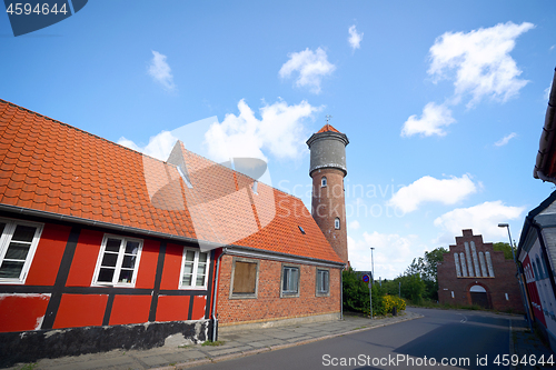 Image of City street with a tower in a small village