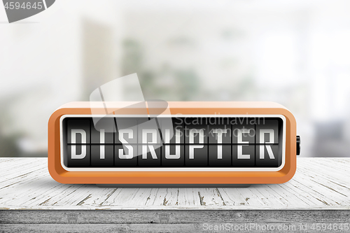 Image of Disrupter alarm on a wooden table in a bright room