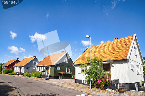 Image of Street with residences on a row