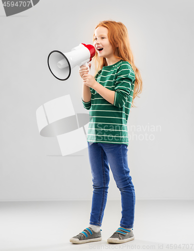 Image of smiling red haired girl speaking to megaphone