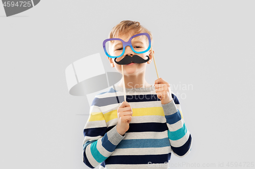 Image of boy with glasses and black vintage moustaches