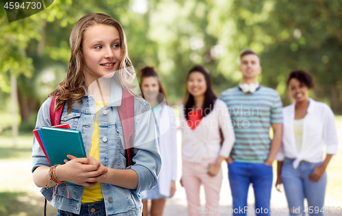 Image of happy smiling teenage student girl with school bag