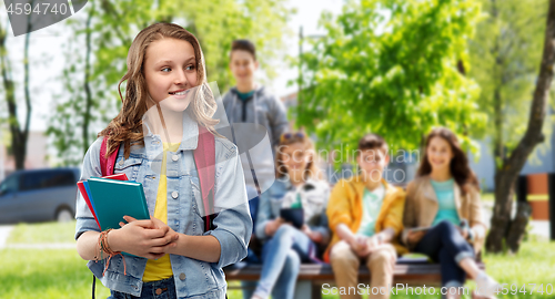 Image of happy smiling teenage student girl with school bag