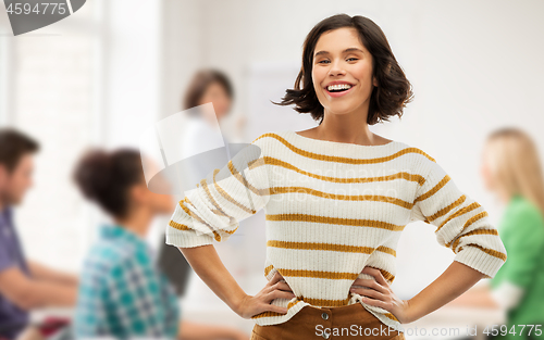 Image of student girl with hands on hips at school