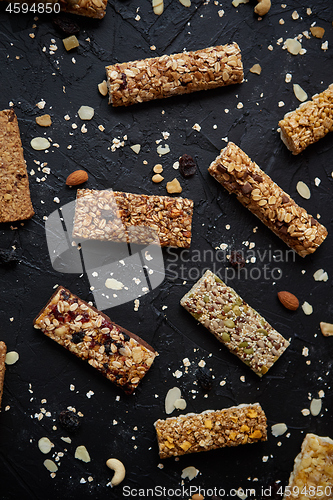 Image of Mixed gluten free granola cereal energy bars. With dried fruits and nuts