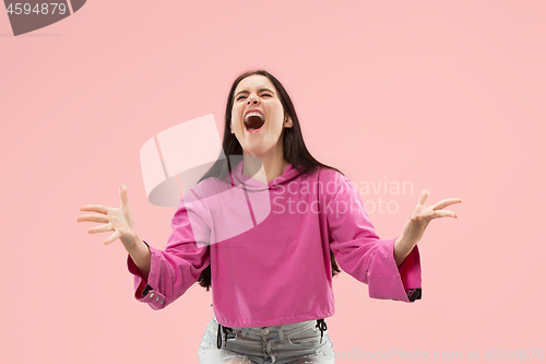 Image of Winning success woman happy ecstatic celebrating being a winner. Dynamic energetic image of female model