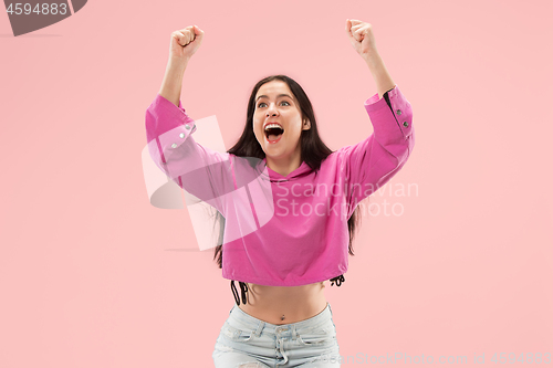 Image of Winning success woman happy ecstatic celebrating being a winner. Dynamic energetic image of female model