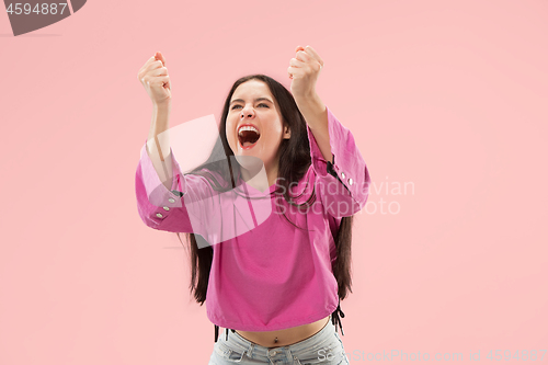 Image of Winning success woman happy ecstatic celebrating being a winner. Dynamic energetic image of female model