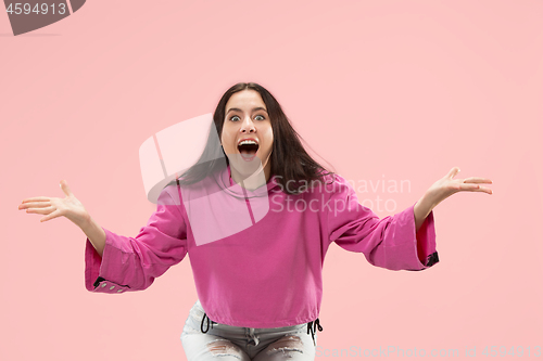 Image of Winning success woman happy ecstatic celebrating being a winner. Dynamic energetic image of female model