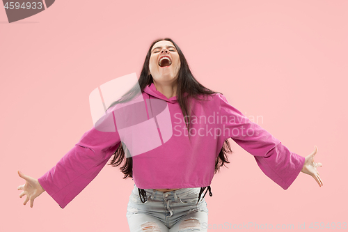 Image of Winning success woman happy ecstatic celebrating being a winner. Dynamic energetic image of female model