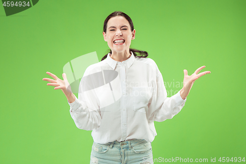 Image of Winning success woman happy ecstatic celebrating being a winner. Dynamic energetic image of female model