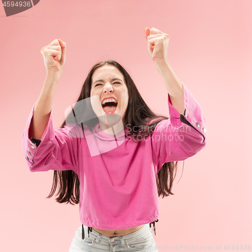 Image of Winning success woman happy ecstatic celebrating being a winner. Dynamic energetic image of female model