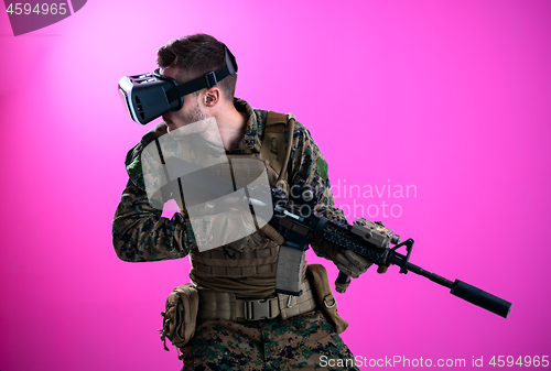 Image of soldier in battle using virtual reality glasses