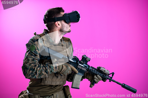 Image of soldier in battle using virtual reality glasses