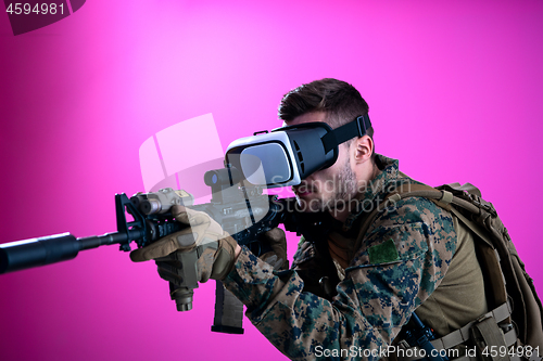 Image of soldier in battle using virtual reality glasses