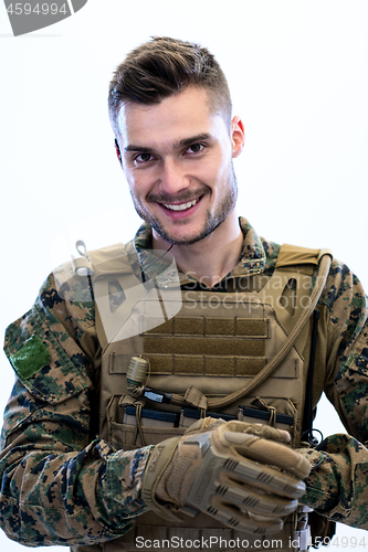 Image of closeup of soldier hands putting protective battle gloves