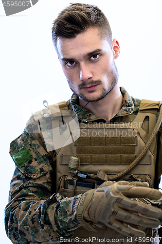 Image of closeup of soldier hands putting protective battle gloves