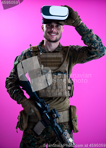 Image of soldier in battle using virtual reality glasses