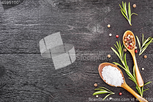 Image of Frame of salt and pepper on black board top