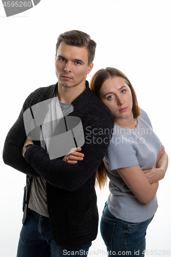 Image of Portrait of a young family in upset feelings