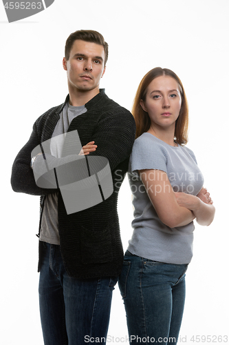 Image of A upset couple looks into the frame