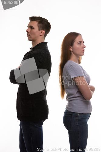 Image of The couple turned away from each other in resentment