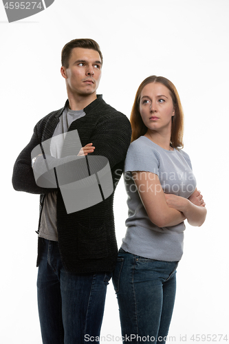 Image of Couple in a sora, looking offended past each other