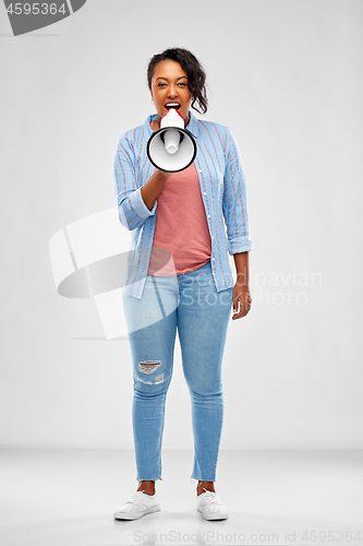 Image of african american woman over grey background