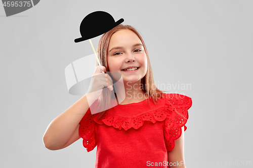 Image of beautiful smiling girl with black bowler hat