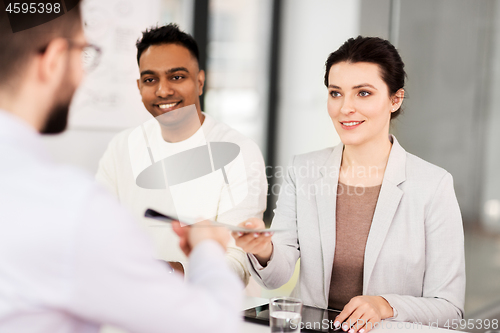 Image of recruiters having job interview with employee