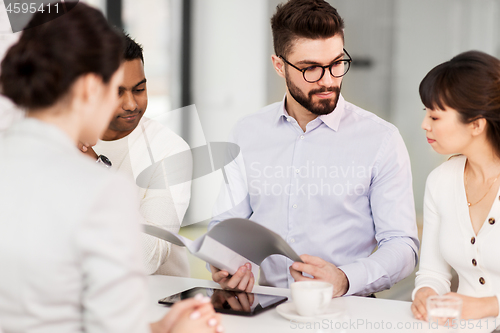 Image of recruiters having job interview with employee