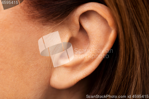 Image of close up of senior woman ear