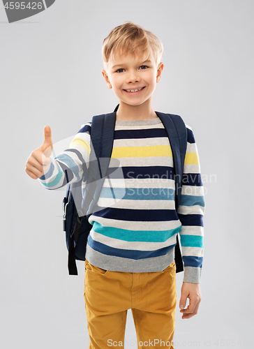 Image of student boy with school bag showing thumbs up