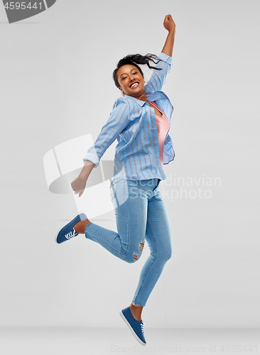Image of happy african american woman dancing